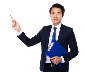 Businessman with clipboard and pen up