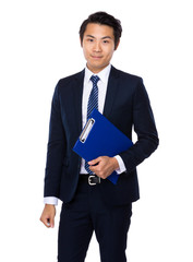 Businessman with clipboard