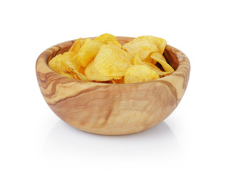 potato chips with paprika in olive bowl