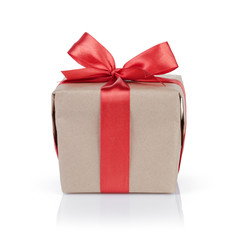 cube gift box wrapped with kraft paper and red bow