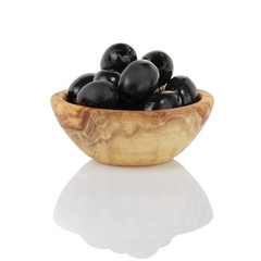 black olives from can in wood bowl