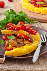 Polenta with vegetables - corn grits pizza with tomato and eggpl