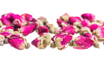 dried rosebuds isolated on white background