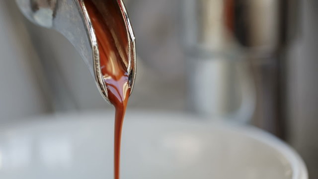 closeup video of exctraction process from espresso machine, made