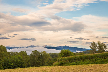 Fototapeta premium peak of a mountain between the clouds