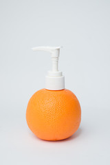 orange pump lotion bottle