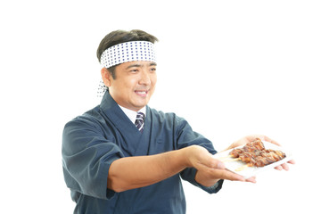 笑顔の焼き鳥屋の主人