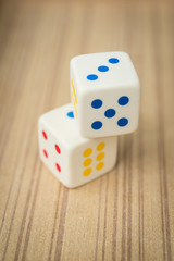 Casino dices on a vintage wooden