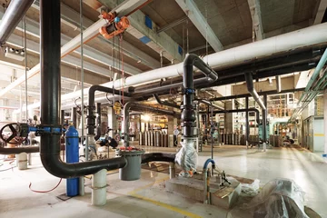 Fotobehang Industrieel gebouw Apparatuur, kabels en leidingen zoals gevonden in industriële stroom