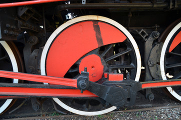 Fototapeta premium Detail of the wheels of an old steam train