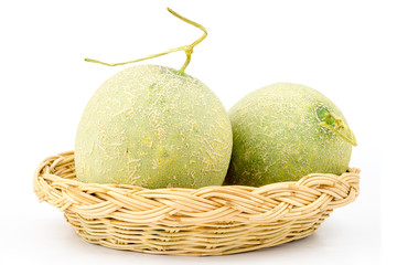 fresh Melon in a basket isolated on white