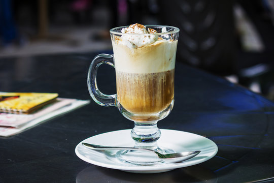 Cafe Coffee - Latte in a glass with cream