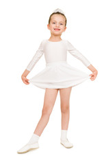 little girl dancing in a white ball gown