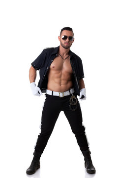 Image of sexy muscular cop posing at camera