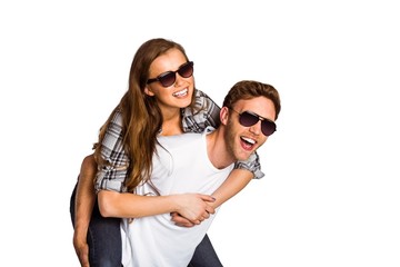 Smiling young man carrying woman