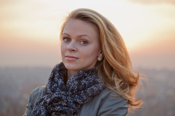 Young girl blonde on simple background