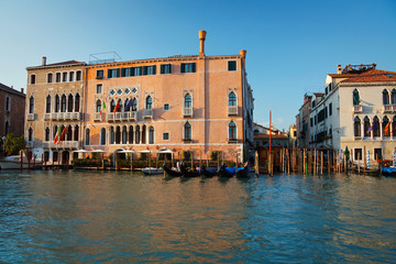 Fototapeta na wymiar Gondolas in Grand canal in Venice, Italy.