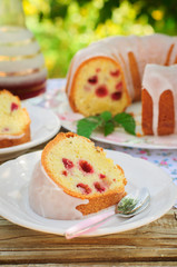 A Slice of Lemon and Caraway Seed Bundt Cake with Raspberries