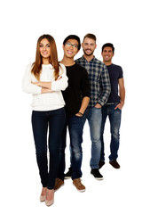 Fototapeta premium Full length portrait of a smiling friends standing in a row