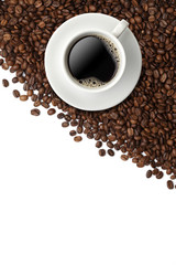 Cup of coffee on beans