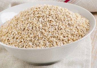 Healthy Oat bran in  white bowl