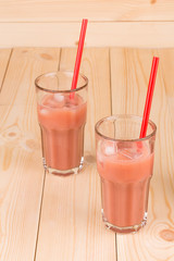 Two glasses of strawberry smoothie