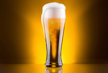 Frosty glass of light beer