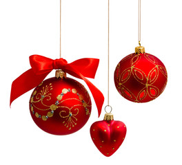 Red christmas balls with ribbon isolated on a white