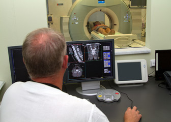 Woman as a patient being investigated for magnetic resonance sca