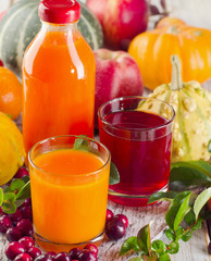 Bottle and glasses of healthy fresh juice