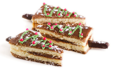 Christmas tree made of sweet cake isolated on a white