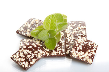 Mix chocolate and mint close up on white