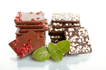 Mix chocolate and mint close up on white