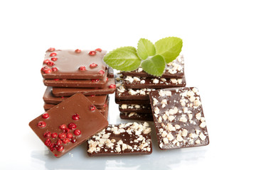 Mix chocolate and mint close up on white