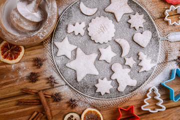 Festive cookies decorated on rustic table