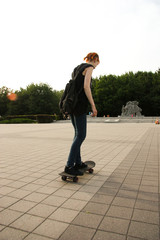 Beauty Girl Skating in gardens