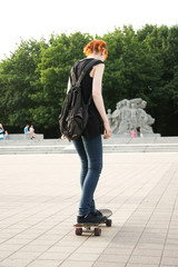 Beauty Girl Skating in gardens