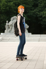 Beauty Girl Skating in gardens