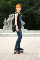 Beauty Girl Skating in gardens