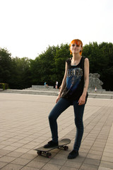Beauty Girl Skating in gardens