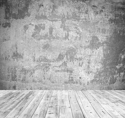 Interior of grunge empty room with white wall and wooden floor