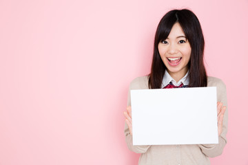 Fototapeta premium young asian woman on pink background