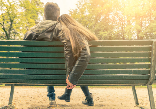 Couple In Love On A Bench