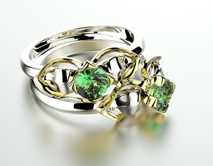 Golden Engagement  Ring with  Emerald. Jewelry background