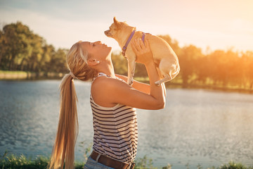 Blonde girl and chihuahua