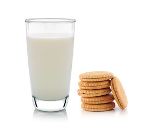 Glass of milk and cookies isolated on white