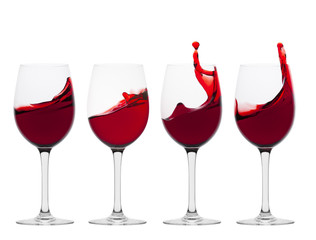 Wine glasses in with splash of wine