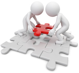 zwei M&auml;nnchen mit passendem Puzzleteil