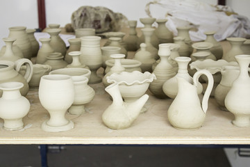 Fototapeta na wymiar Ceramic jugs and cups