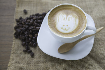 Easter rabbit drawing on latte art coffee cup